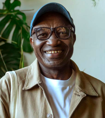 A picture of a male smiling